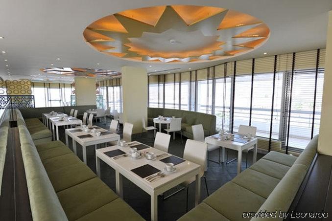 Al Raya Suites Hotel Al-Manamah Restoran foto